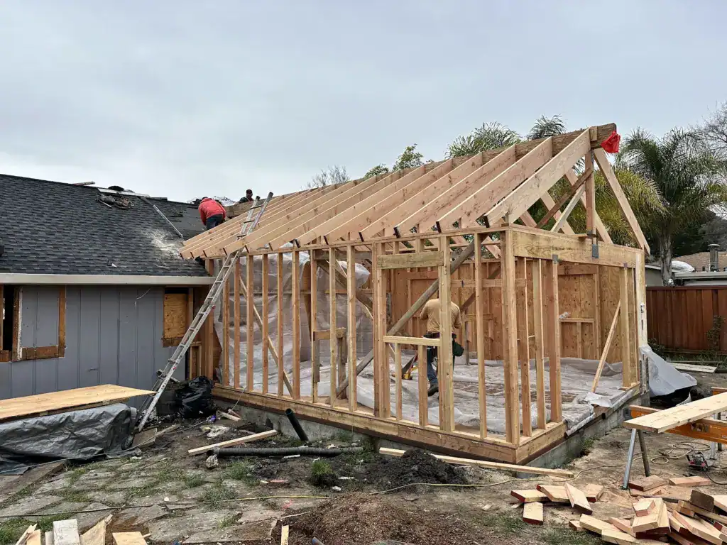 Gable roof framing during construction of a home addition in Pleasant Hill, California