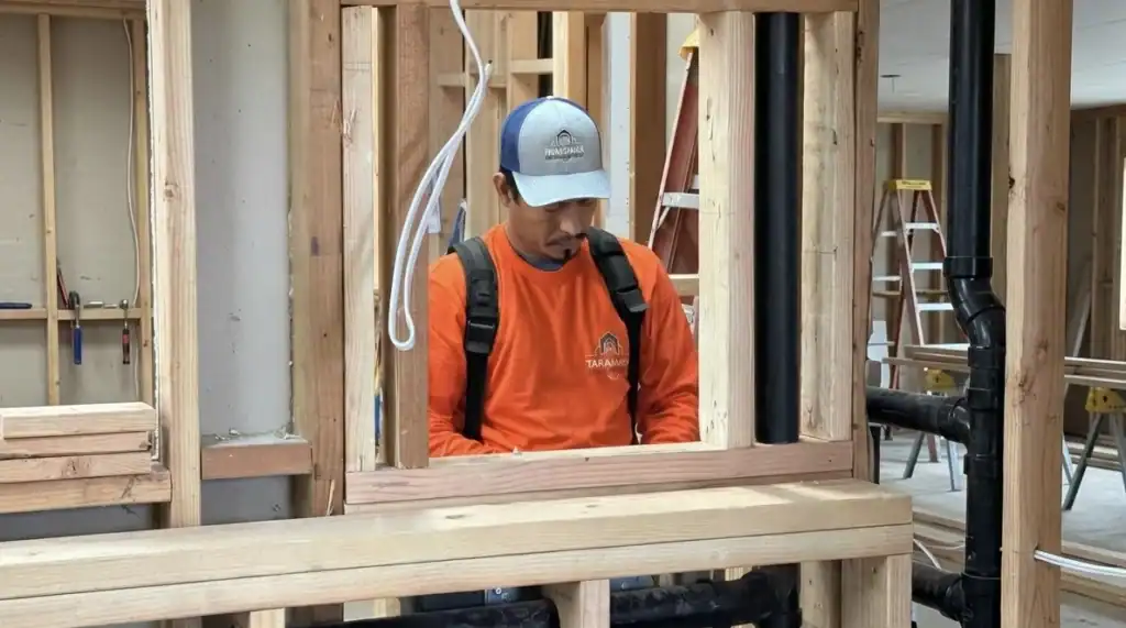 Taragano Design and Build team member installing plumbing and rough framing during a custom home remodeling project in the East Bay