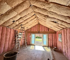 Insulated vaulted ceiling framing. Insulated vaulted ceiling and wall framing in a residential home addition.